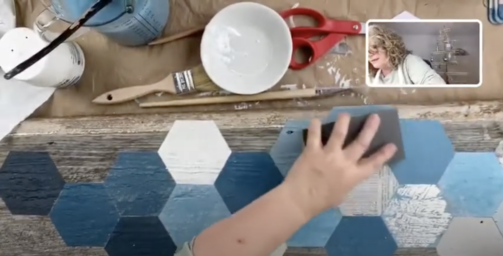 use a sanding block to distress barn quilt